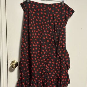 SHEIN Black Asymmetrical Skirt with Red Heart Pattern